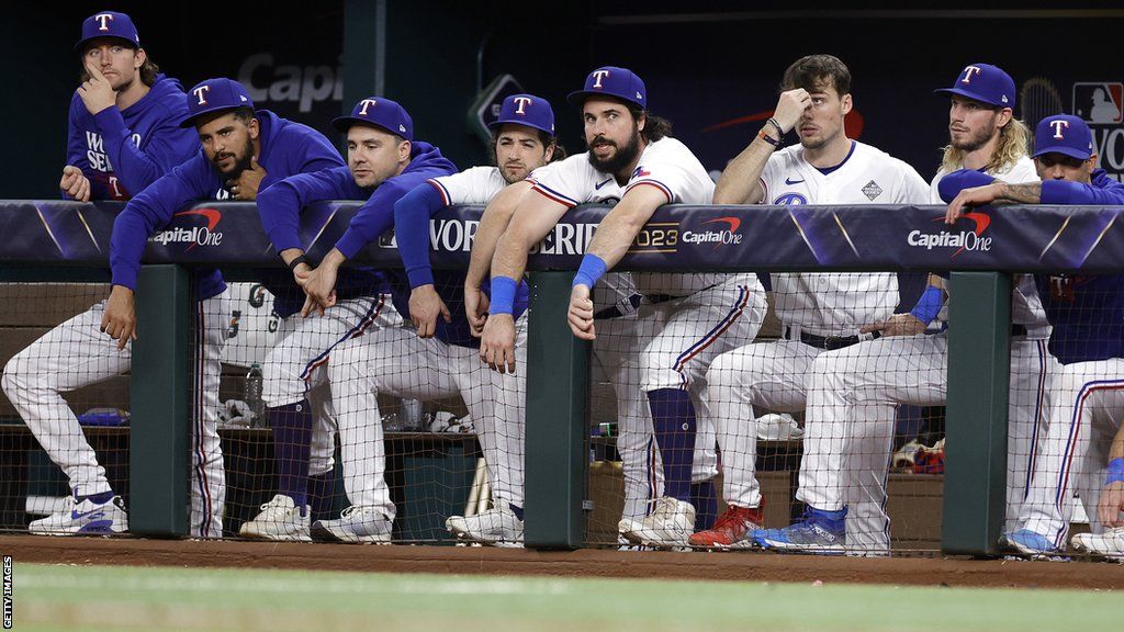 Texas Rangers players look dejected during game two