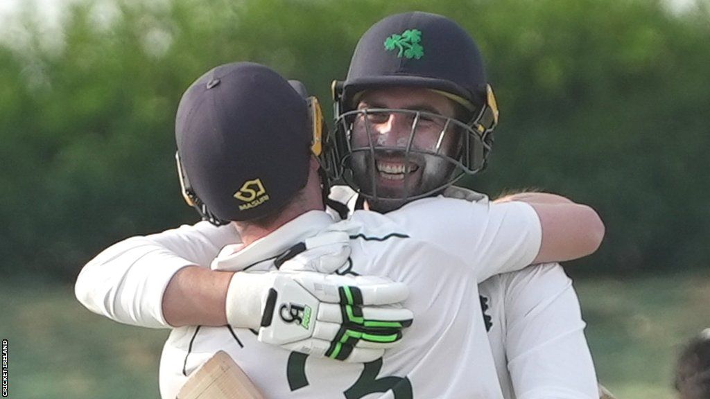 Lorcan Tucker and Andrew Balbirnie embrace after Ireland seal victory over Afghanistan