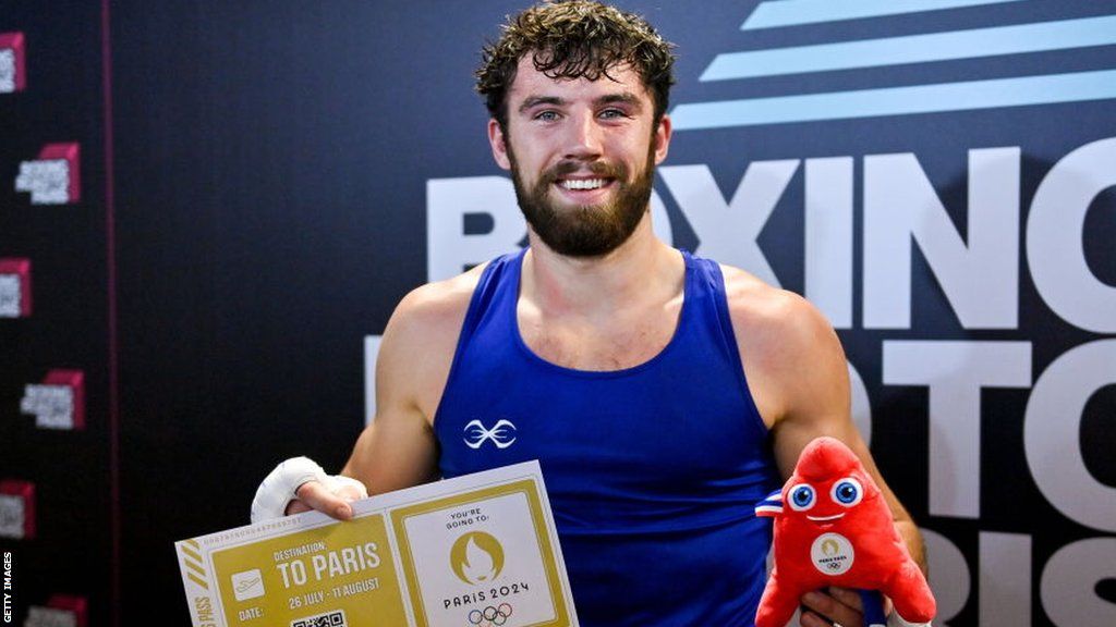 British heavyweight Patrick Brown celebrates clinching a place at the Paris 2024 Olympics