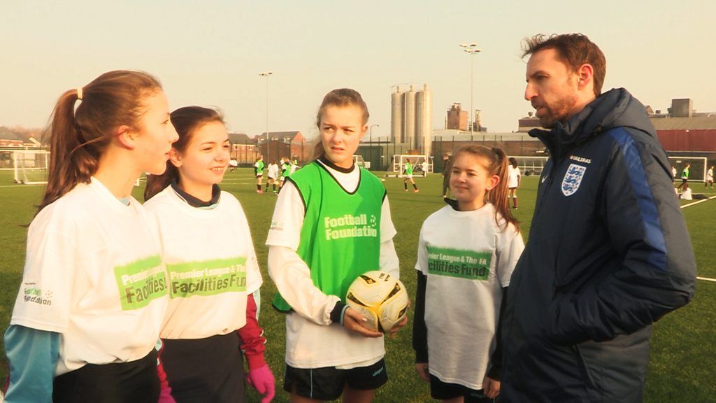 England manager Gareth Southgate and girls taking part at Burton Albion Community Trust