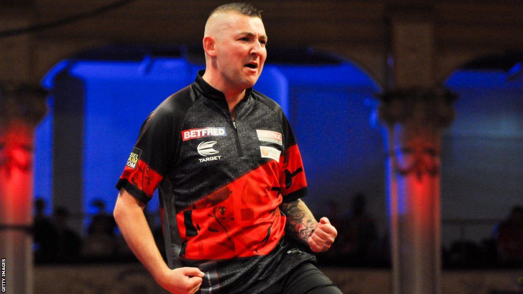 Nathan Aspinall celebrates winning at the 2023 PDC World Matchplay in Blackpool