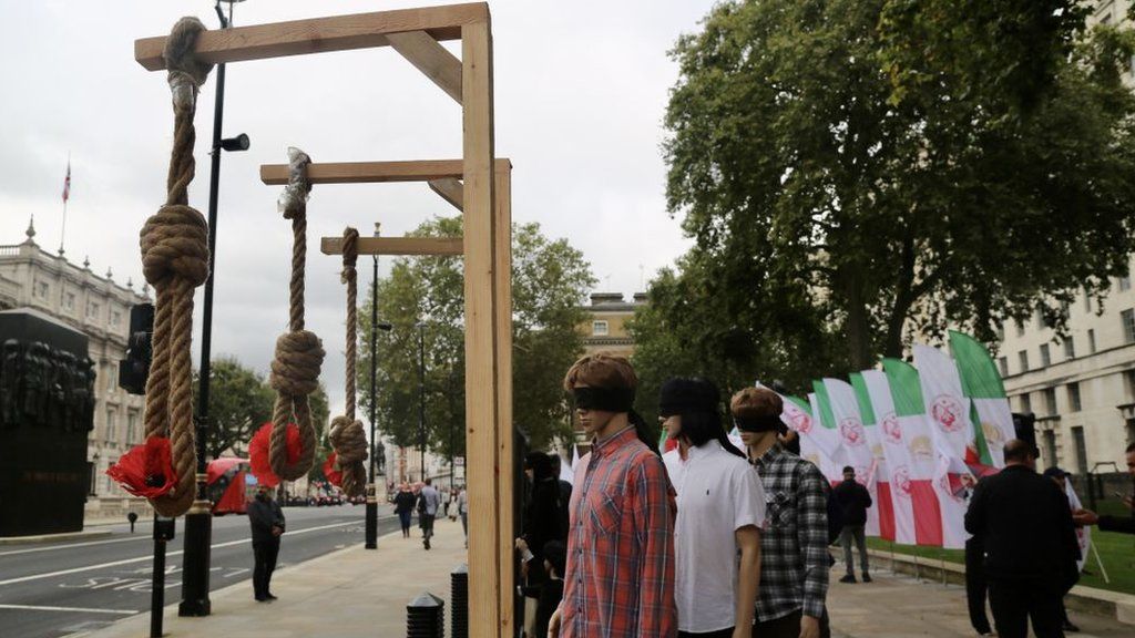 Protesters protest against executions in Iran ahead of World Day Against the Death Penalty in London, UK (8 October 2021)