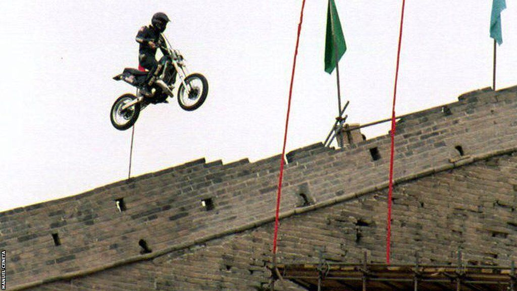 Stunt rider Eddie Kidd jumps the Great Wall of China