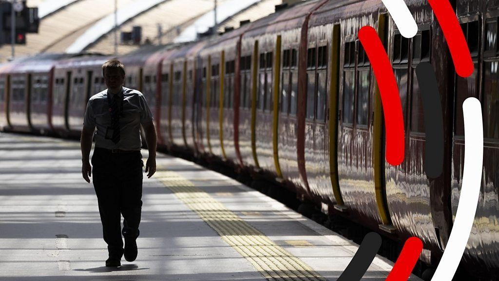 Man walking on a train station platform