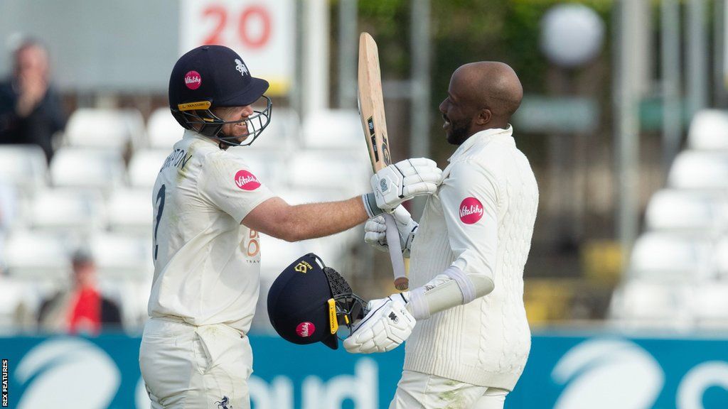 Kent batters Ben Compton and Daniel Bell-Drummond celebrate their partnership of 218 against Esses