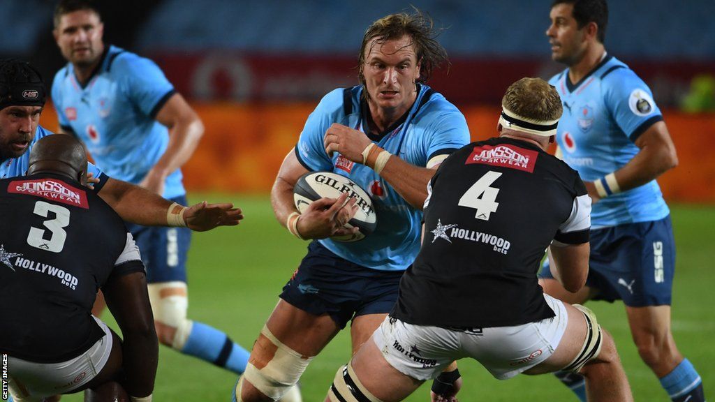 Jacques du Plassis goes into a tackle with the ball during a game for Blue Bulls in 2023