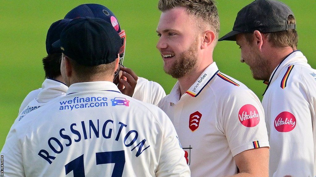 Sam Cook celebrates taking wicket for Essex