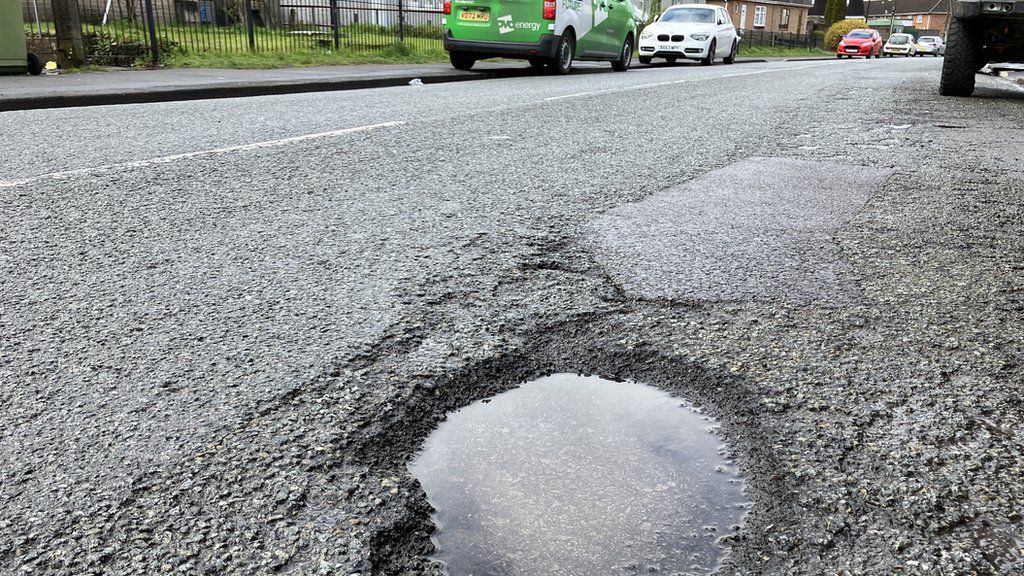 Pothole in road