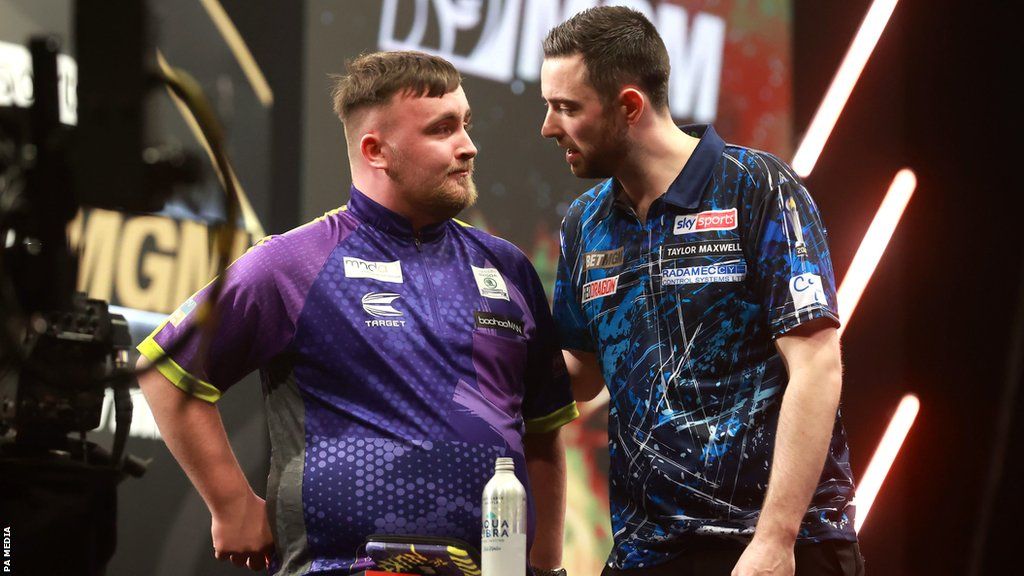 Luke Littler and Luke Humphries acknowledge each other after the former wins in the quarter-finals of Premier League Darts night nine in Belfast