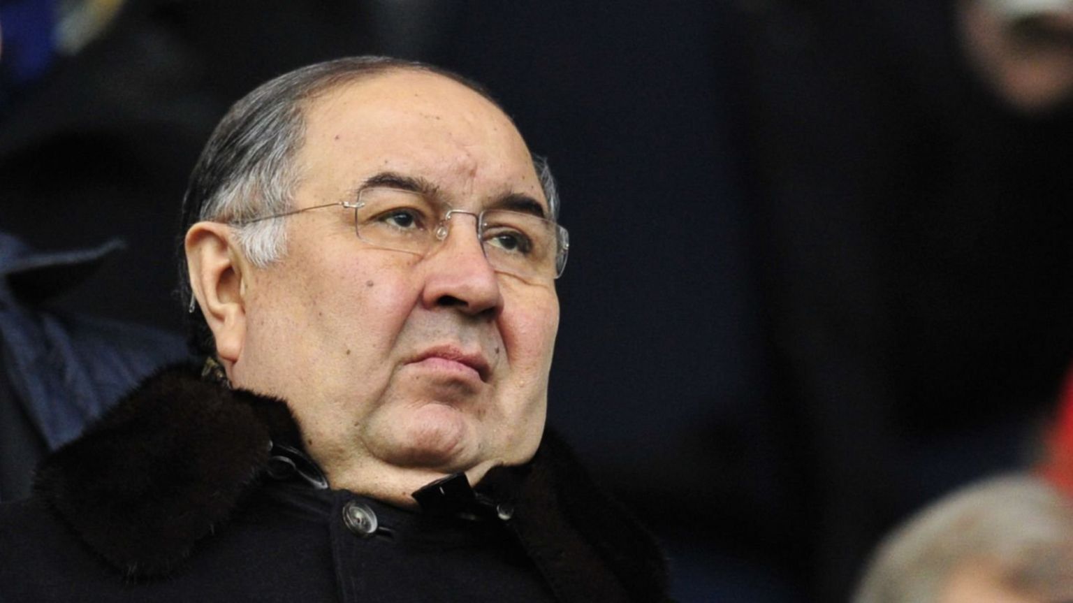 Alisher Usmanov watching an Arsenal game