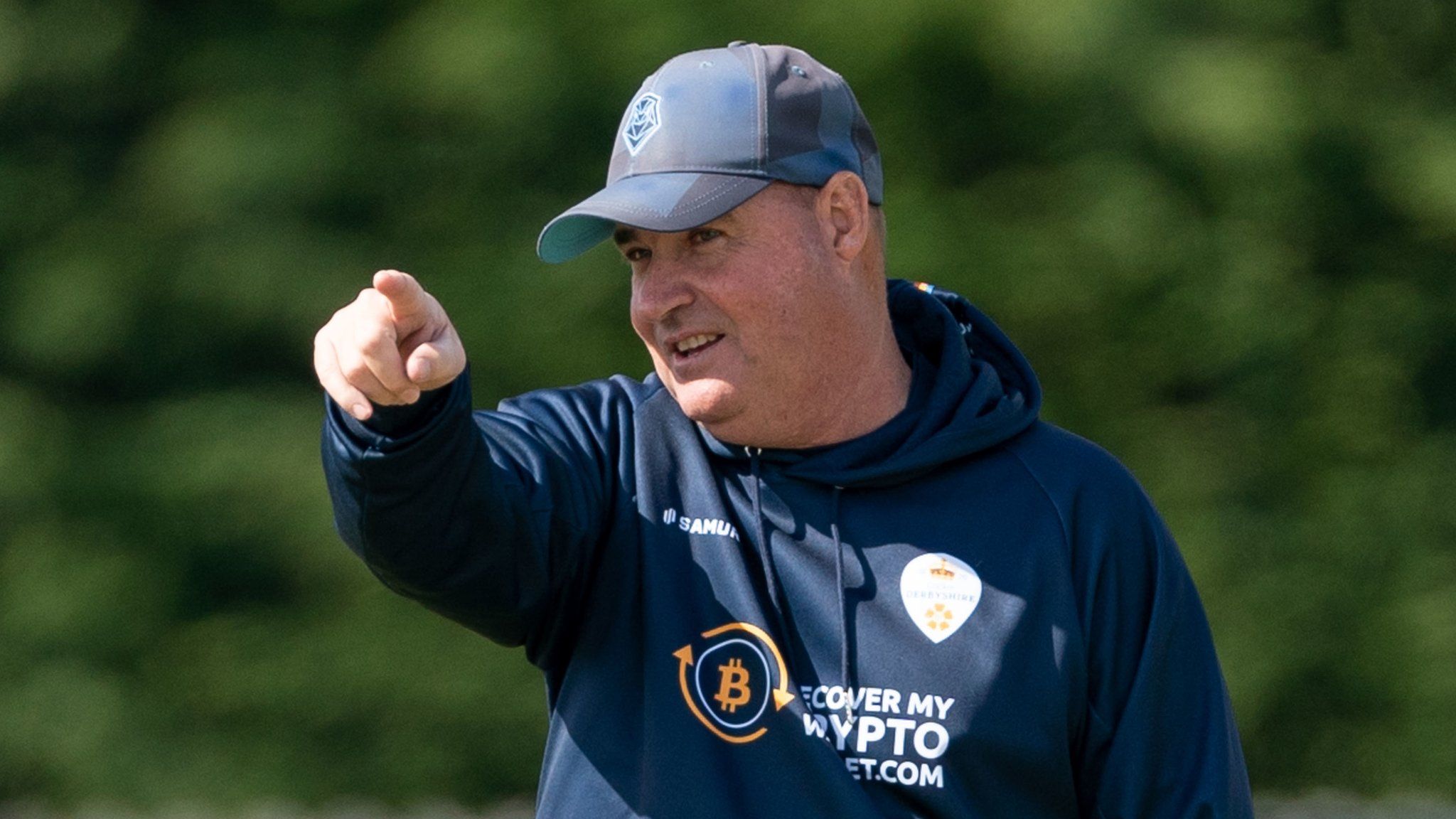 Derbyshire head of cricket Mickey Arthur points during a training session