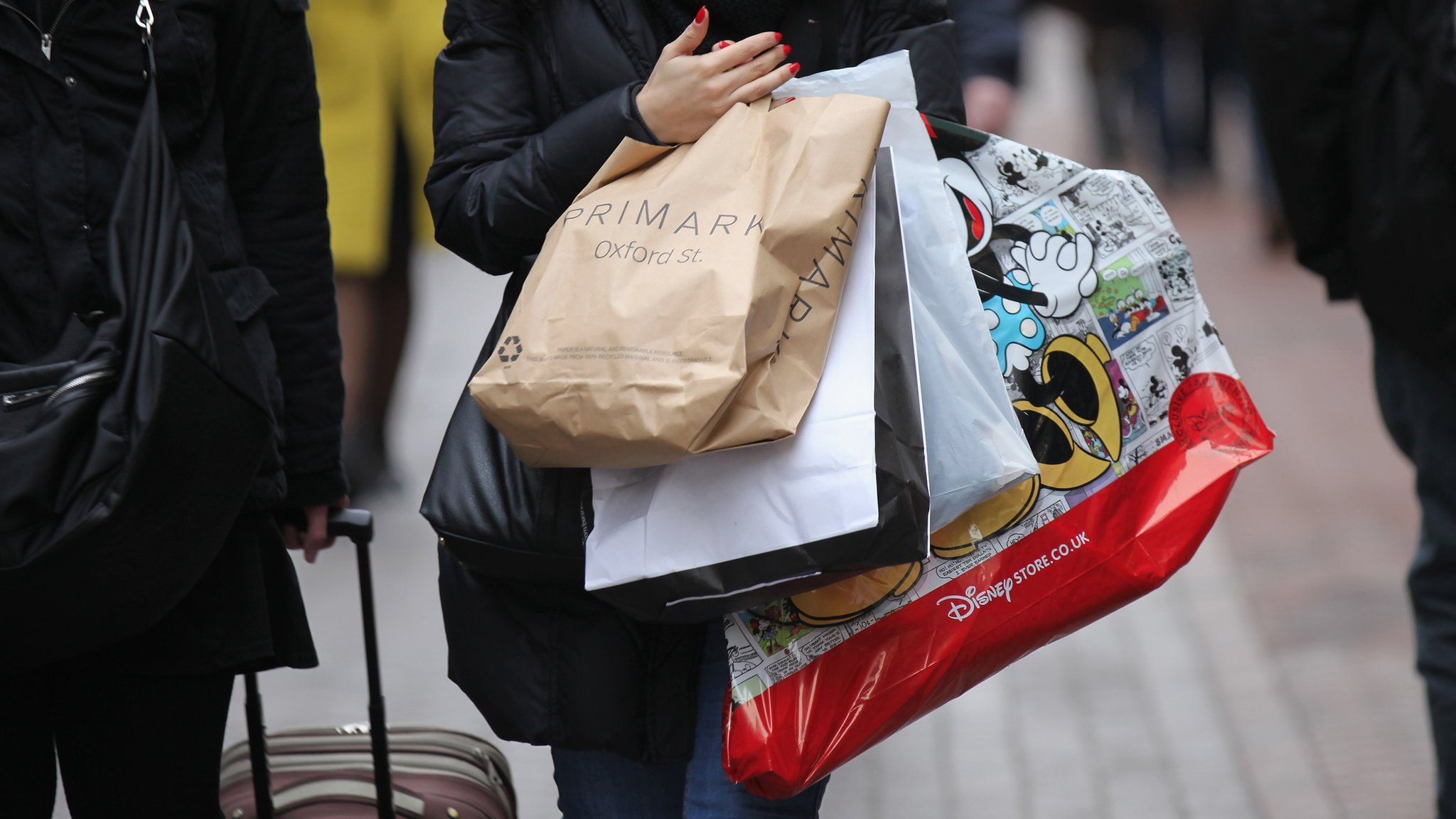 Woman carrying shopping bags