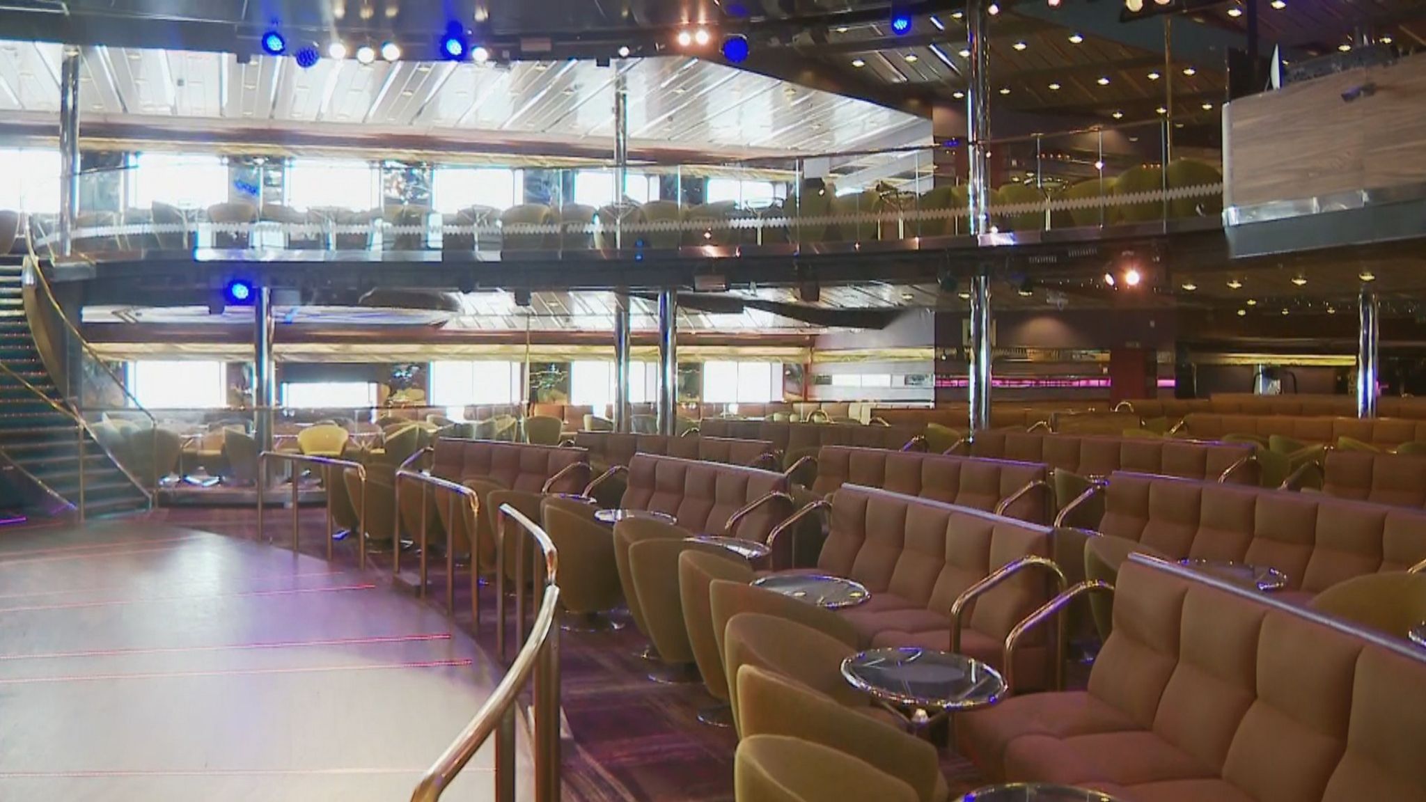 a communal seating space inside the cruise ship