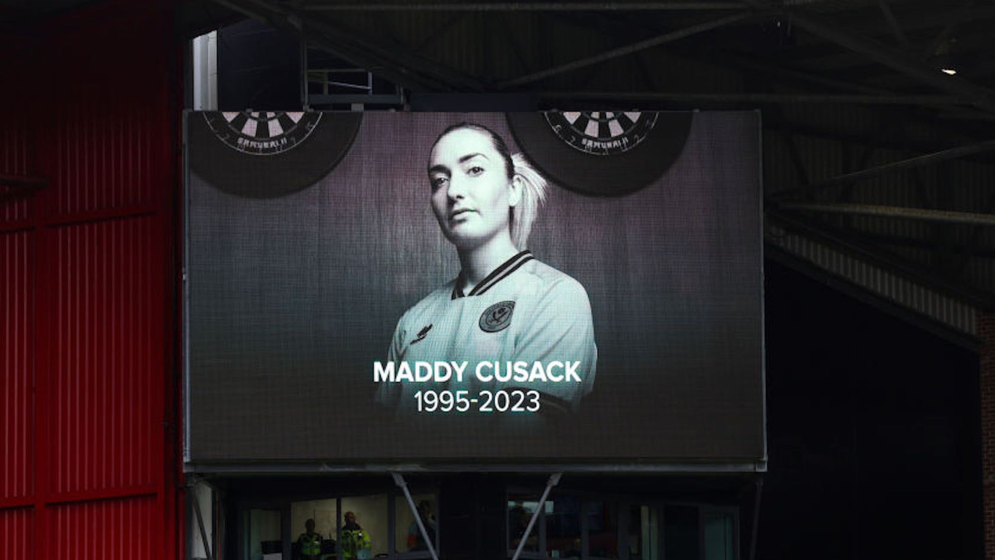 An image of Maddy Cusack with the words 'Maddy Cusack 1995-2023' is displayed on the big screen at Bramall Lane prior to Sheffield United men's Premier League match against Newcastle on 24 September