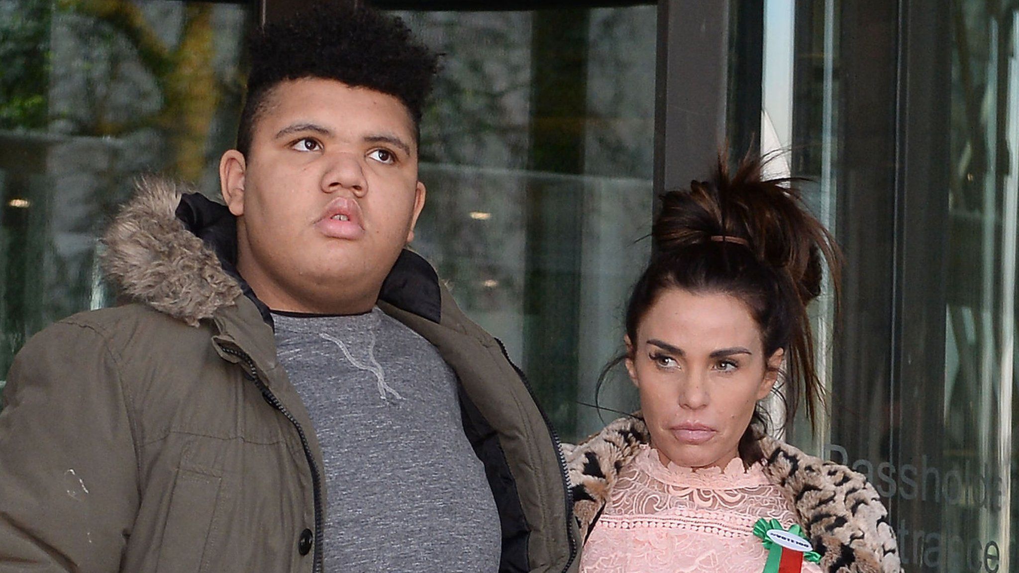 Katie Price with her son Harvey leave Portcullis House in London after giving evidence to the Commons Petitions Committee where she called for online abuse to be made a specific offence.