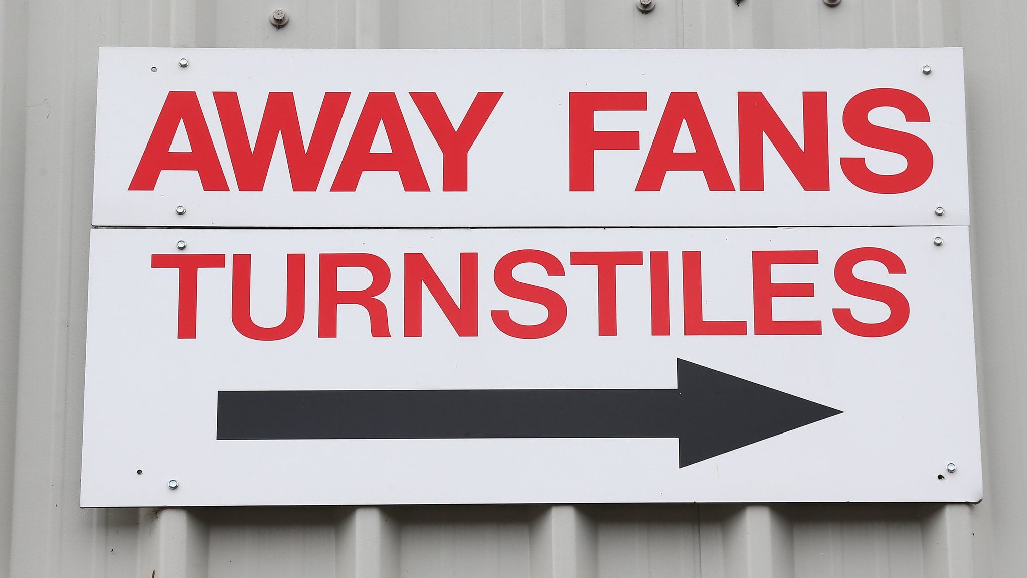 Away fans turnstiles sign outside the Silverlake Stadium at Eastleigh