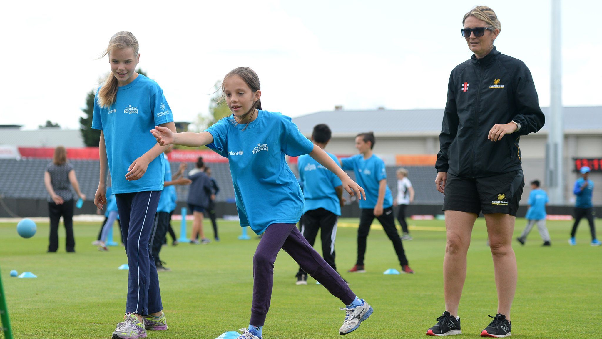 Former England captain Charlotte Edwards coaching some girls