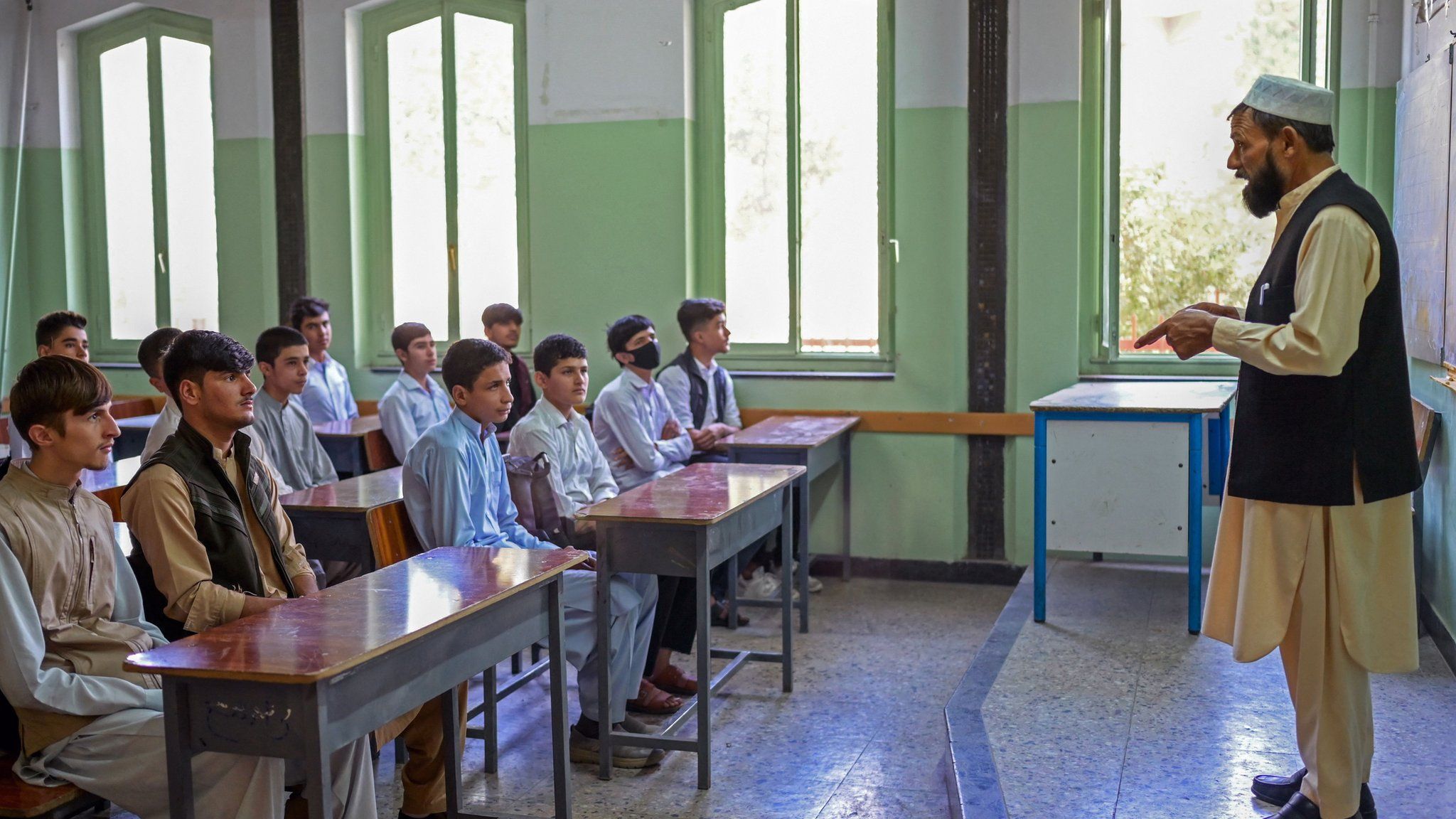 Boys attend their class at Istiklal school in Kabul on September 18, 2021