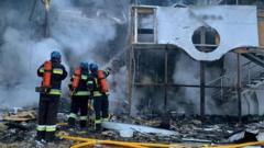 Ukrainian emergency services battle a fire following missile attacks on Zaporizhzhia, Ukraine - 11 Oct 2022