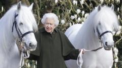 The Queen with two horses