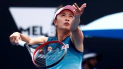 China's Peng Shuai serves during a match against Canada's Eugenie Bouchard in January 2019
