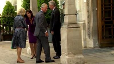 Prince Charles and the Duchess of Cornwall arrive at the hospital to visit Prince Philip on Friday