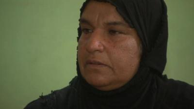 Umm Ahmed, an Iraqi woman whose son, husband and brothers-in-law vanished overnight