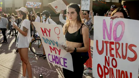 Abortion rights protesters chant during a Pro Choice rally at the Tucson Federal Courthouse in Tucson, Arizona on Monday, July 4, 2022