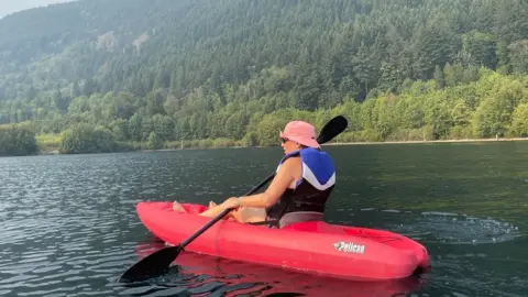 Ms Wingfield on a canoe in Canada