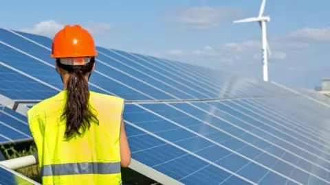 Engineer at a solar panel