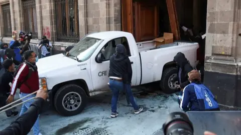 Truck backing into Mexico National Palace door