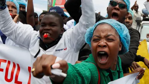 Woman shouting during a demonstration