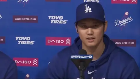 Shohei Ohtani (right) and LA Dodgers interpreter