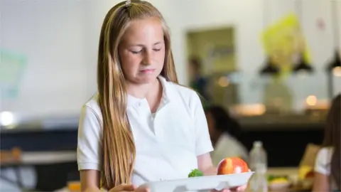 Girl not happy with school meal