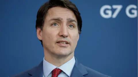 Canadian Prime Minister Justin Trudeau attends a press conference with German Chancellor Olaf Scholz (not pictured) after talks at the Chancellery on March 9, 2022 in Berlin, Germany.