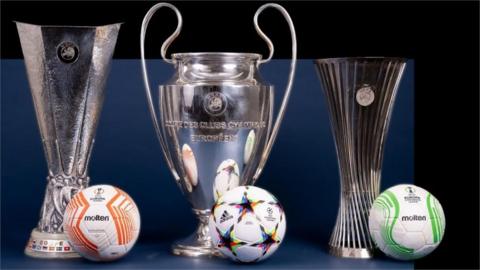 Conference League, Champions League and Europa League trophies