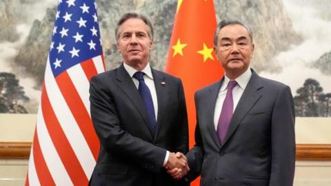 US Secretary of State Antony Blinken, left, meets China's Foreign Minister Wang Yi at the Diaoyutai State Guesthouse