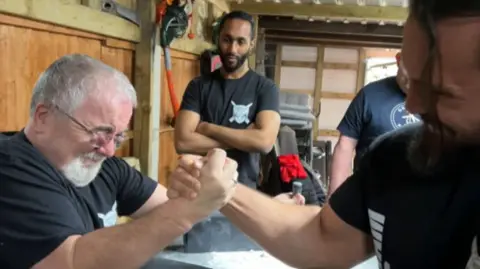 The arm-wrestling club