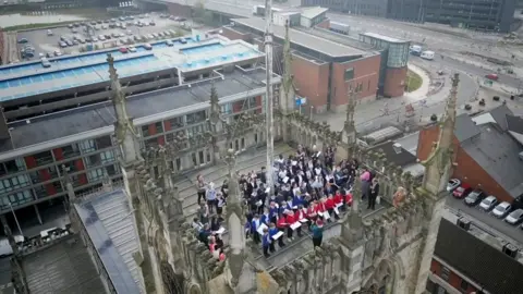 Aerial picture of children on roof