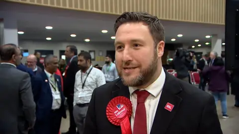 Pete Marland, leader of Milton Keynes City Council, talking to a BBC reporter