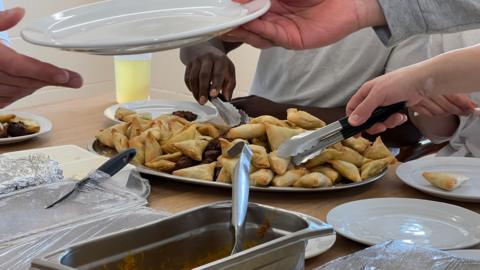 Inmates break fast with traditional foods they've requested