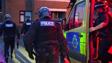 Police undergoing raids in Liverpool