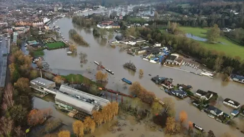 An aerial view of Henley on Thames with a flooded Thames