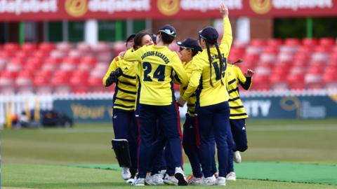 South East Stars celebrate a wicket