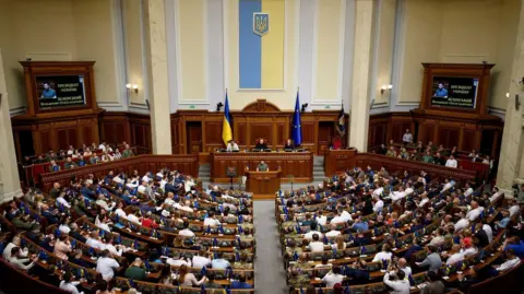 Ukrainian President Volodymyr Zelensky addresses the nation's parliament in Kyiv in 2023.