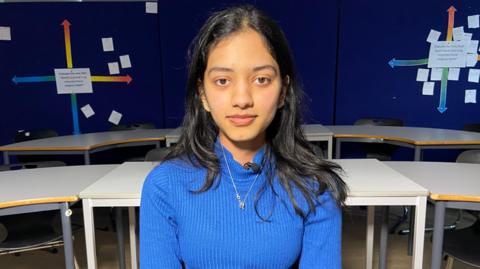 Sixth form student Shreya in a classroom