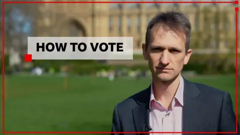 BBC reporter wearing a suit standing outside Houses of Parliament. Text readsHOW TO VOTE