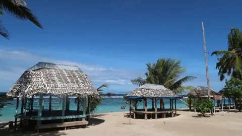 Beach fales or huts in Saleapaga, Samoa