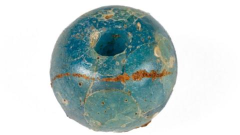 A bead found during the excavation