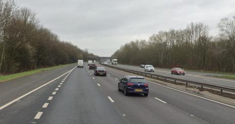 file image of vehicles on M57